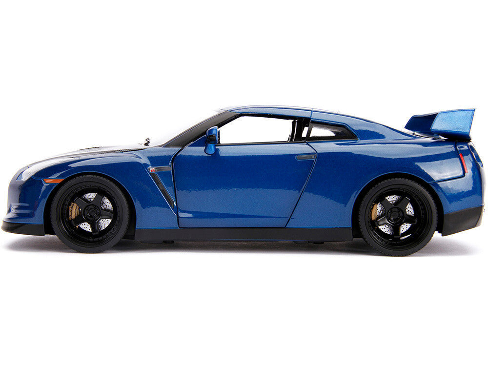 Blue sports car model on a white background