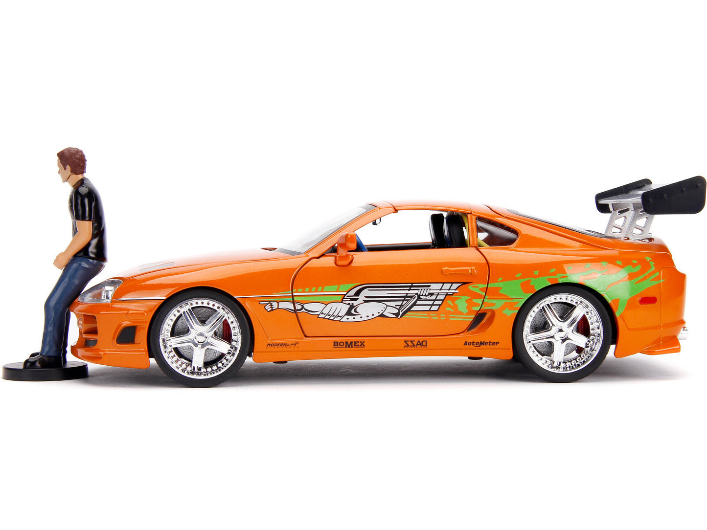 Orange toy car with character figure on a white background