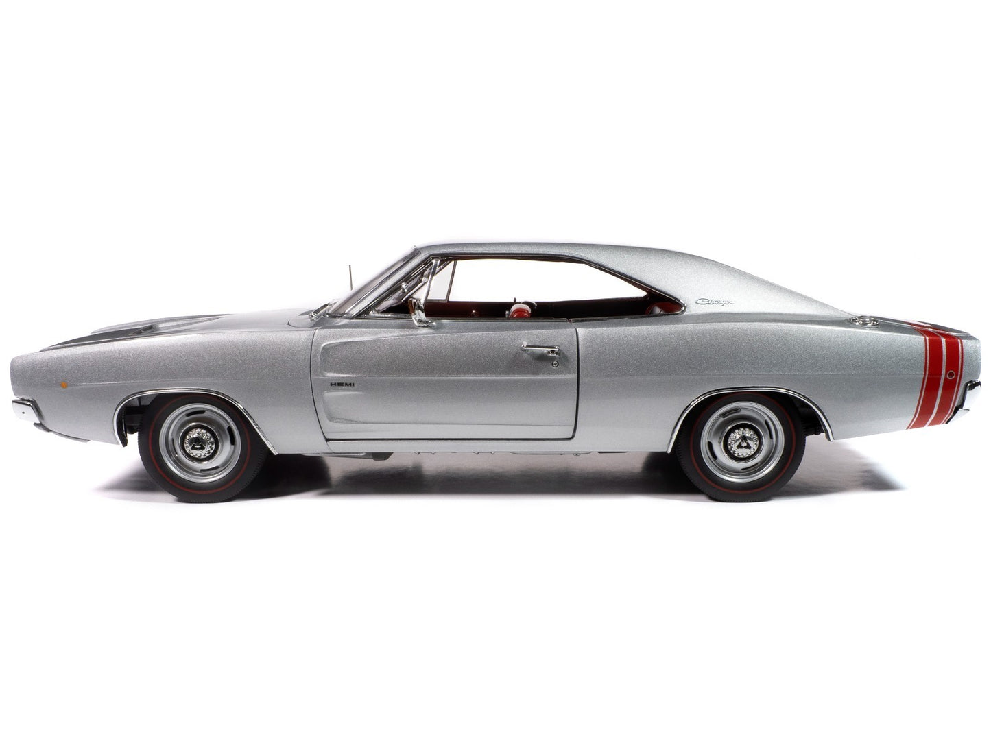 Side view of a classic silver muscle car with red stripes on a white background