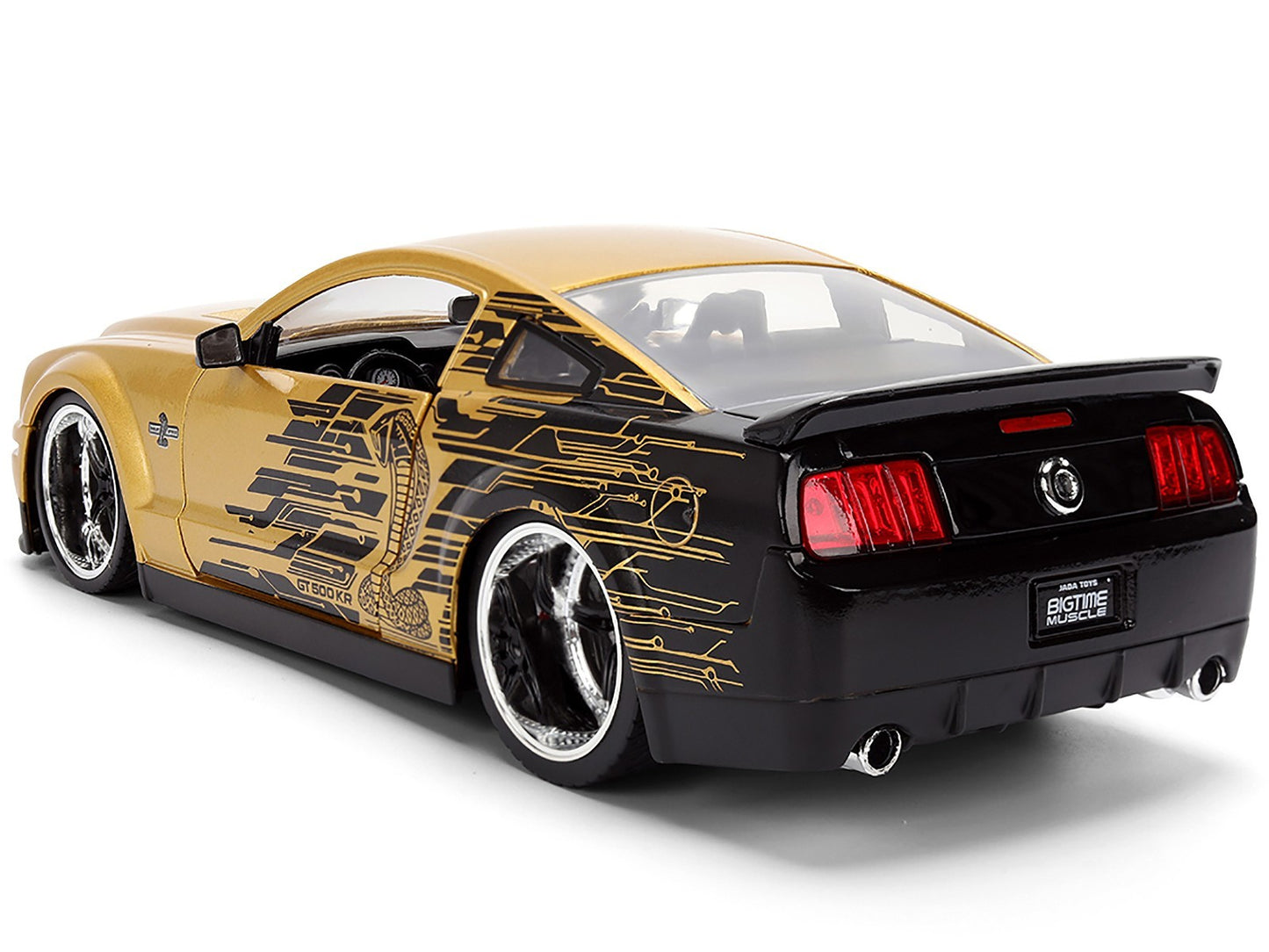 Gold and black sports car with intricate design on a white background