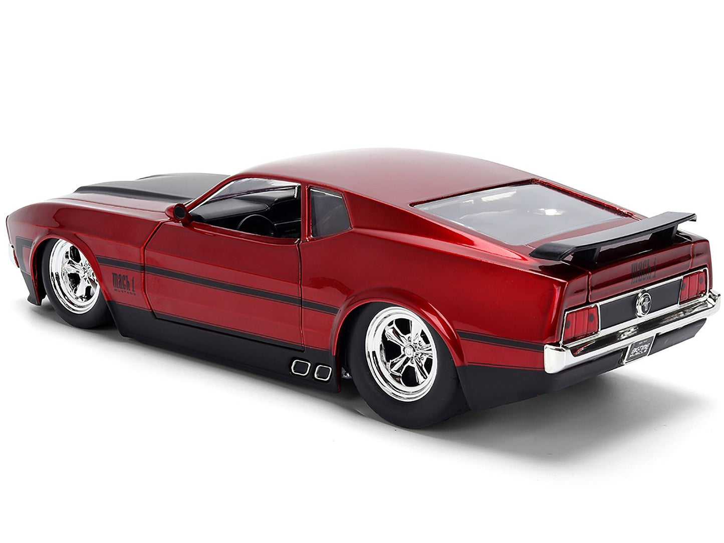Red model car with black stripes on a white background