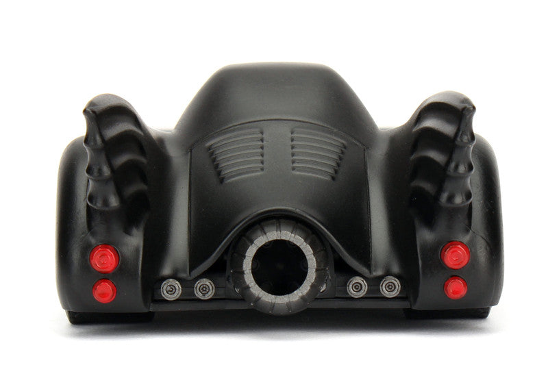 Black motorcycle engine cover with red lights on a white background