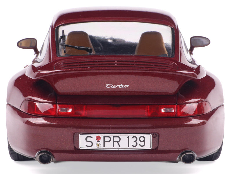 Red Porsche 911 Turbo car with a white background
