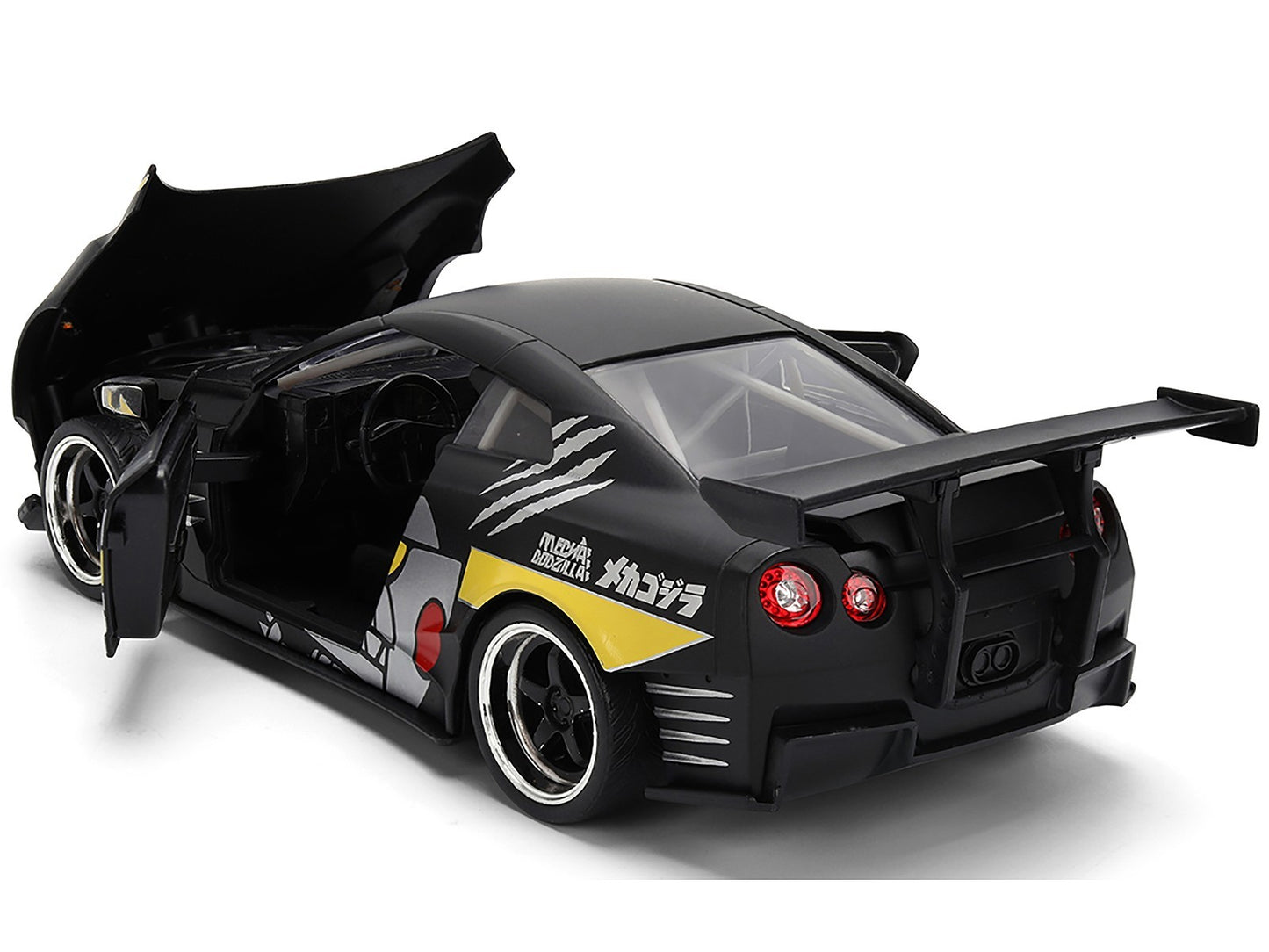 Black and yellow toy car with open doors on a white background