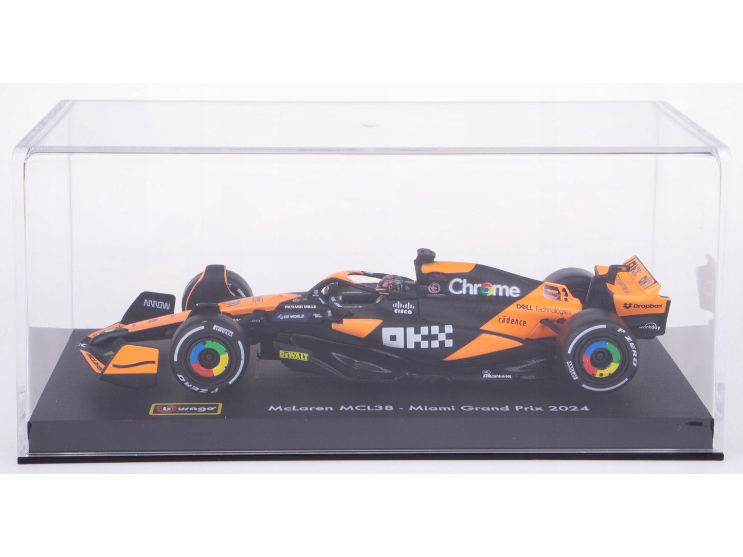 Model of a McLaren F1 car in a clear display case