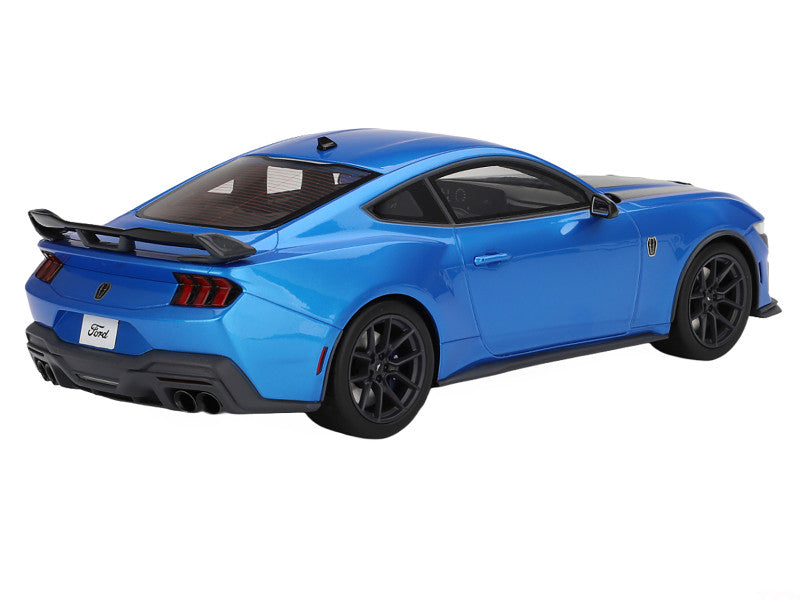 Blue Ford Mustang sports car on a white background