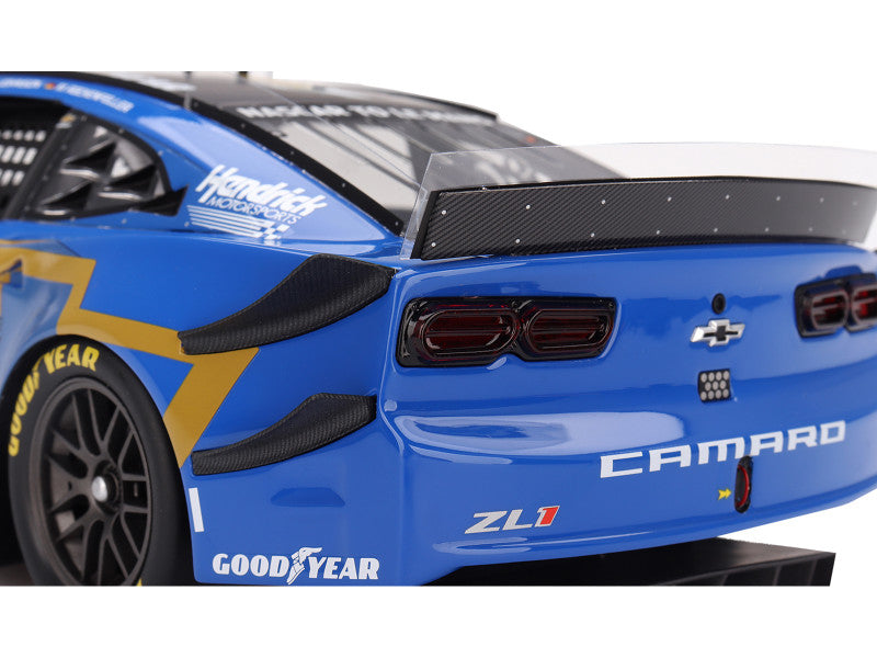 Blue Chevrolet Camaro ZL1 race car with visible branding on a white background