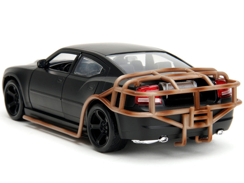 Black car model with a brown front bumper on a white background