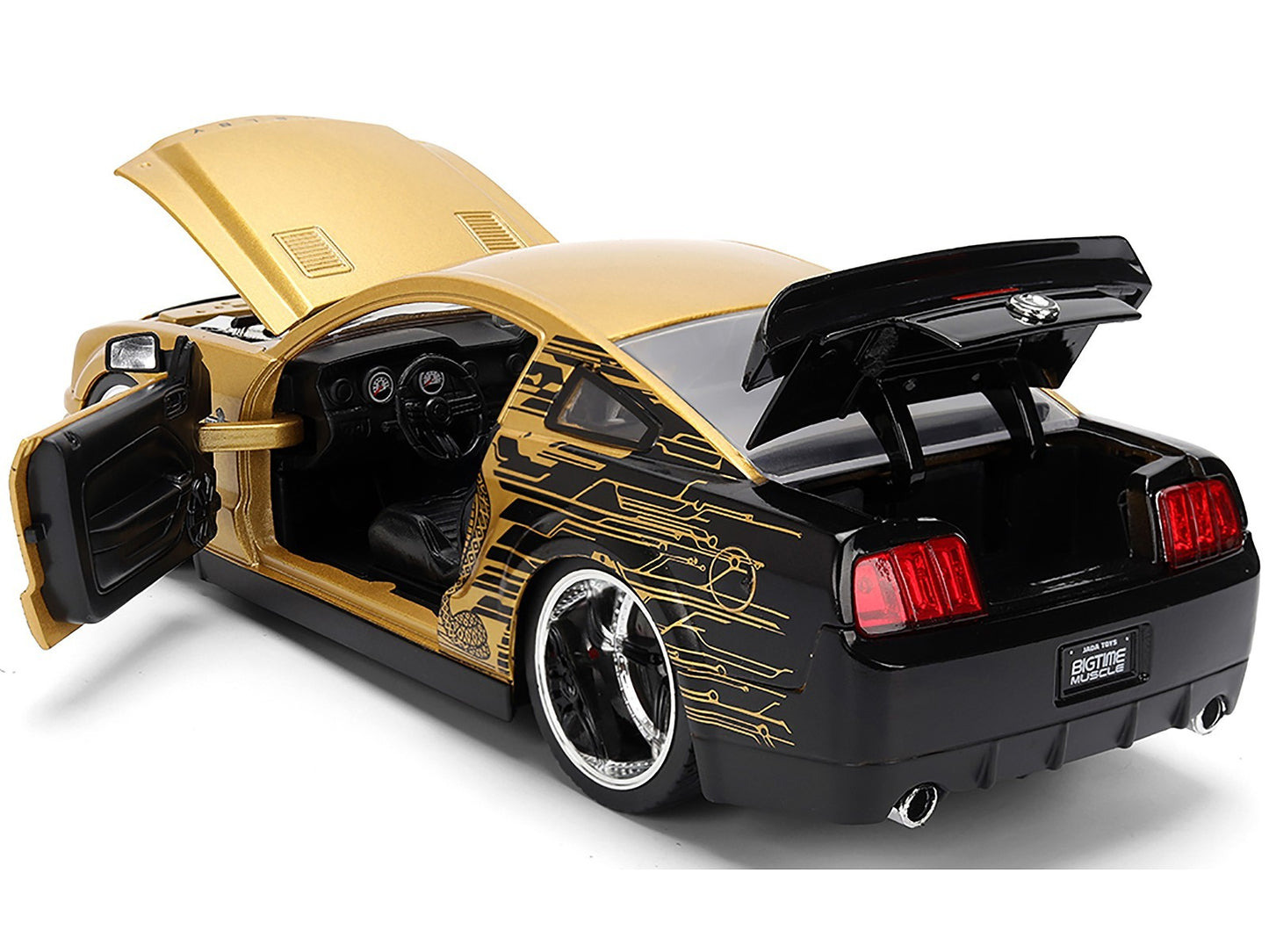Black and gold car model with open doors and trunk on a white background