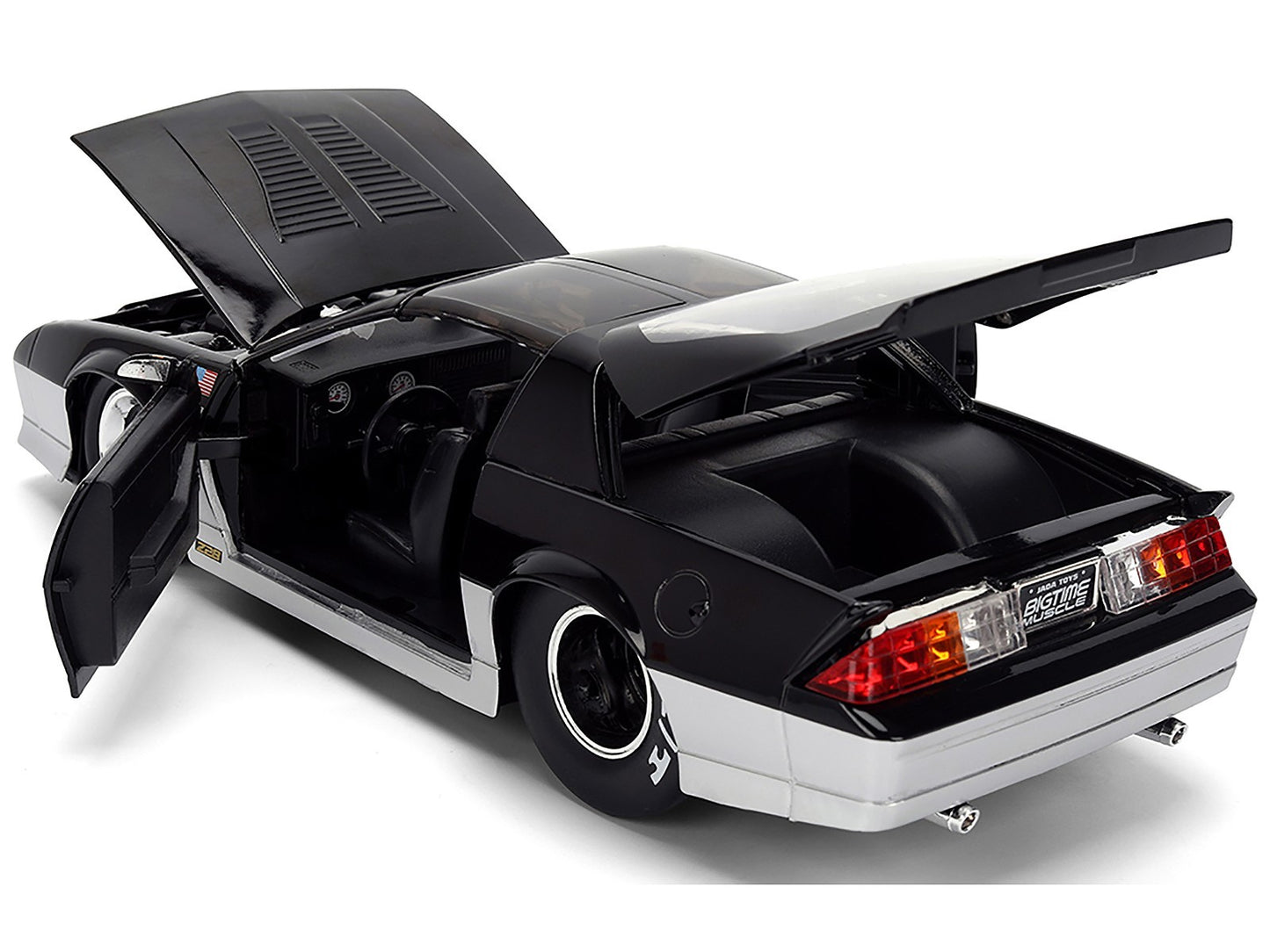 Black sports car with open doors on a white background