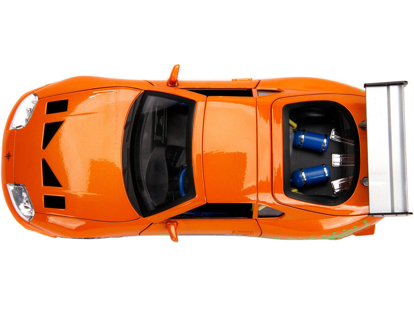 Orange toy car with open doors on a white background