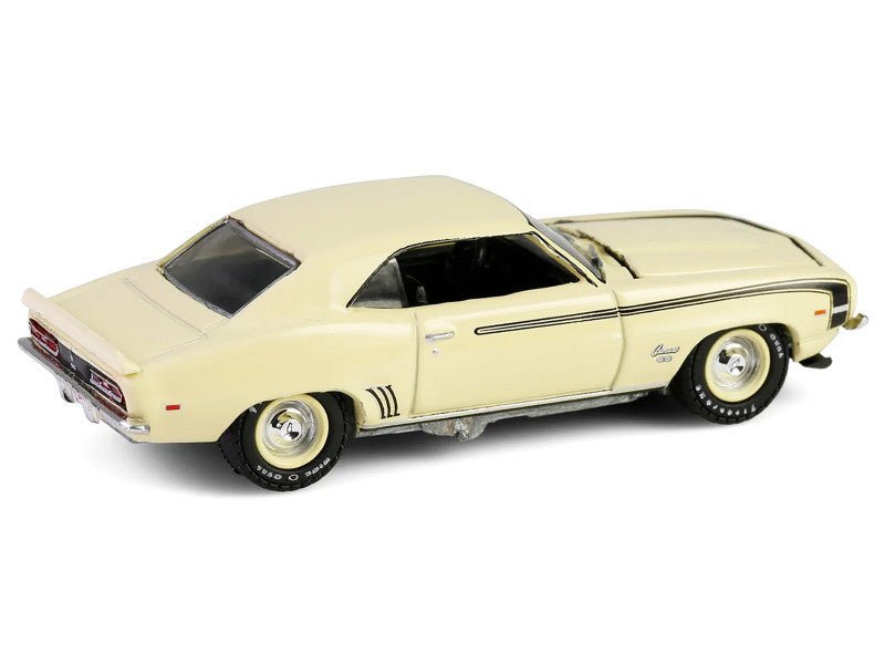 Model of a classic car in beige color on a white background