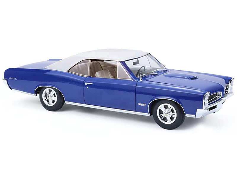 Blue classic car model on a white background