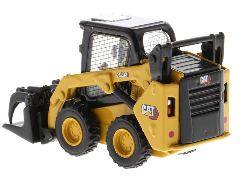 Toy skid steer loader with CAT branding on a white background