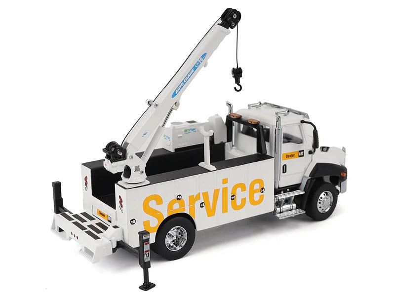 Service truck with boom extended and stabilizers