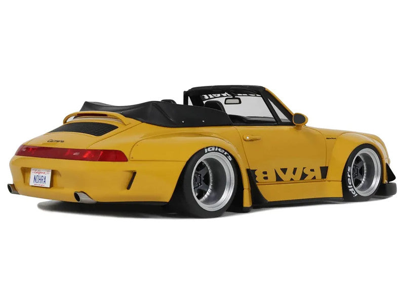 Yellow sports car with black interior on a white background
