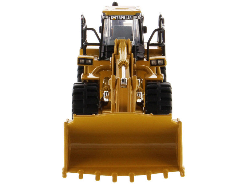 Model of a Caterpillar bulldozer on a white background