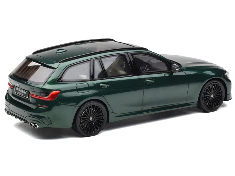 Model of a green car on a white background