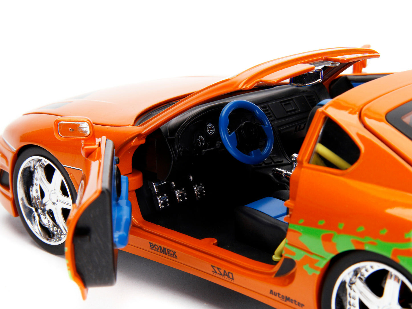 Orange toy car with open doors on a white background