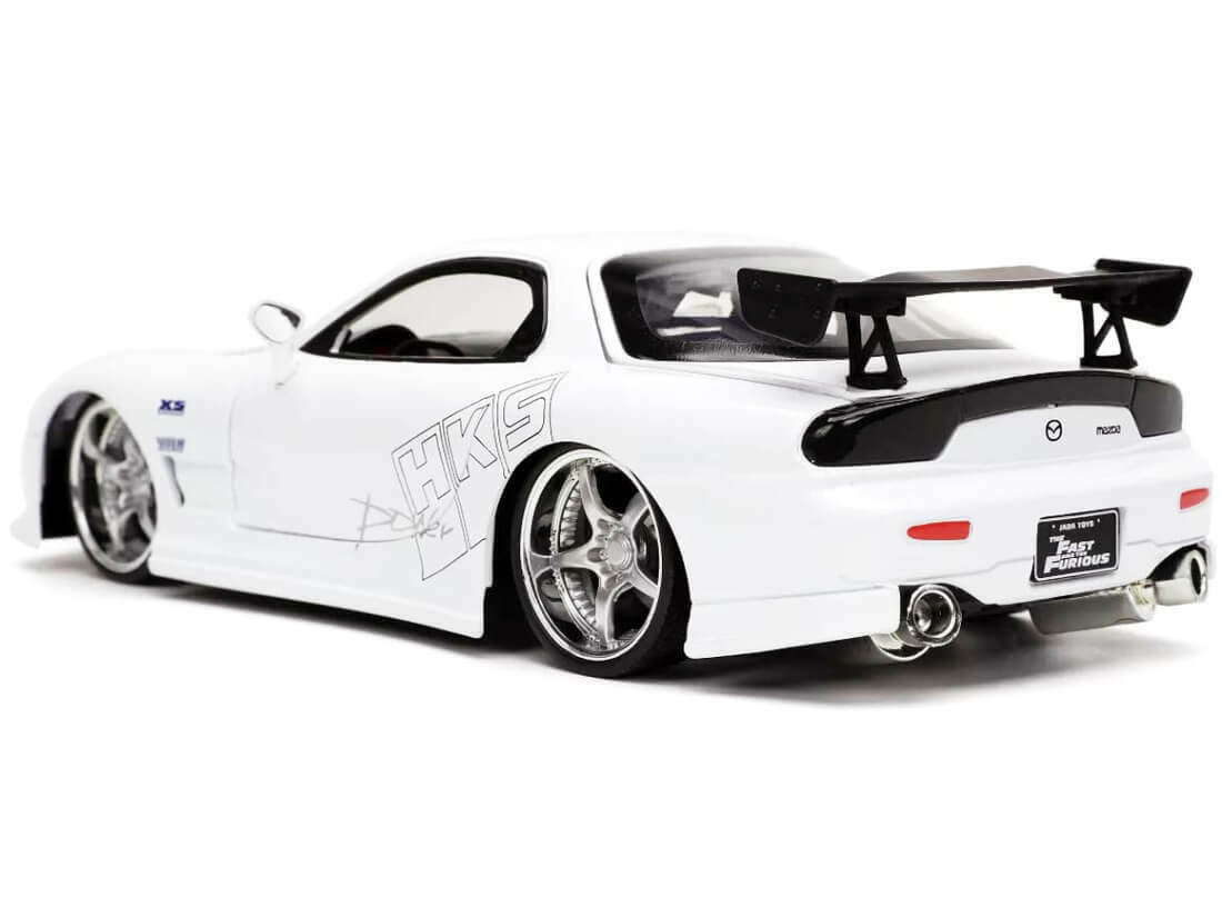 White sports car with black accents on a white background