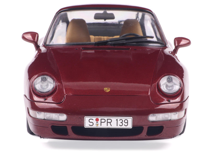 Maroon Porsche car model with a visible license plate on a white background