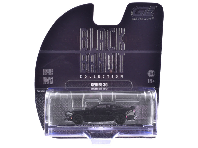 Model car in clear packaging with 'Black Collection' label on a white background