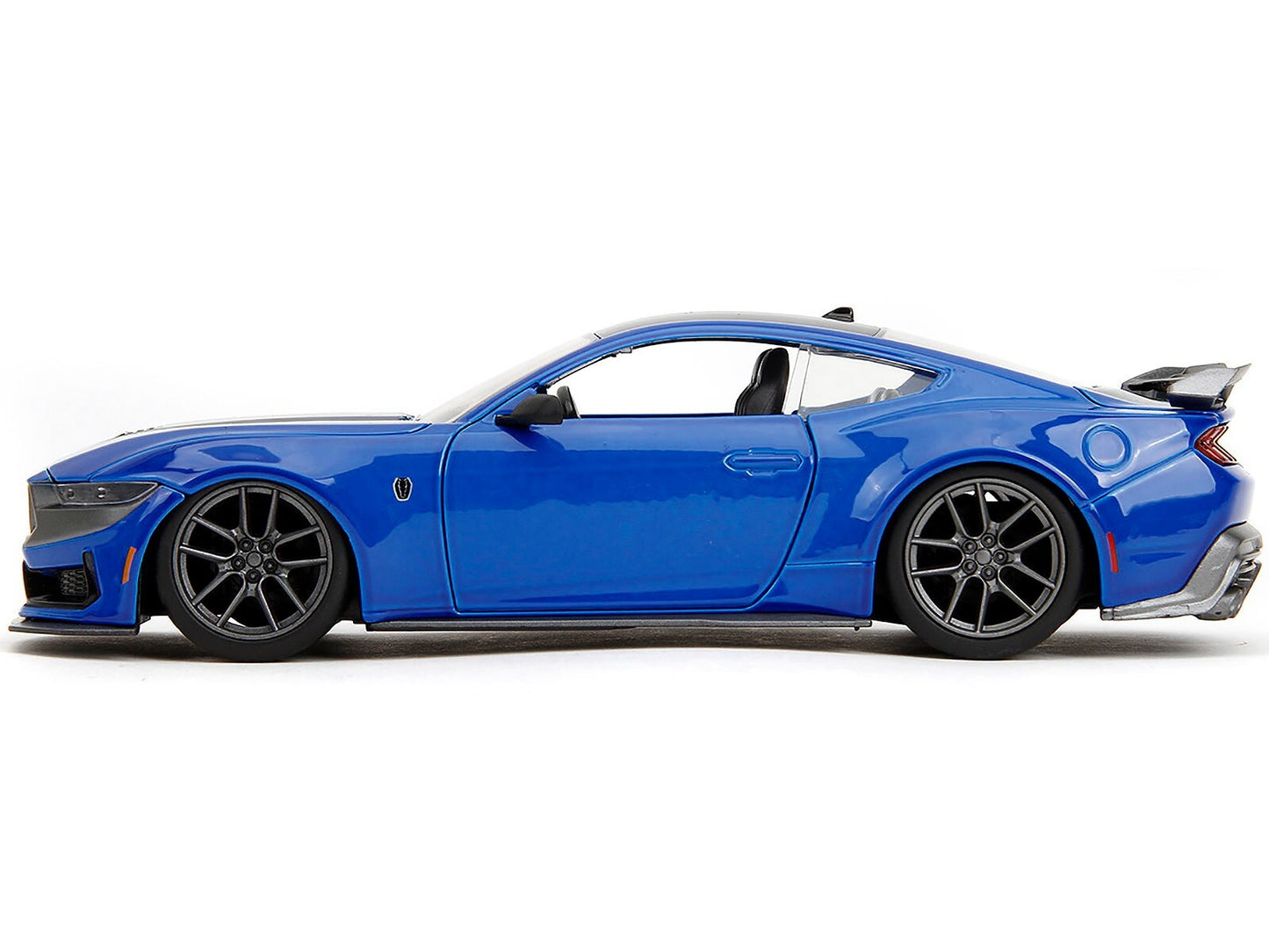 Blue sports car on a white background
