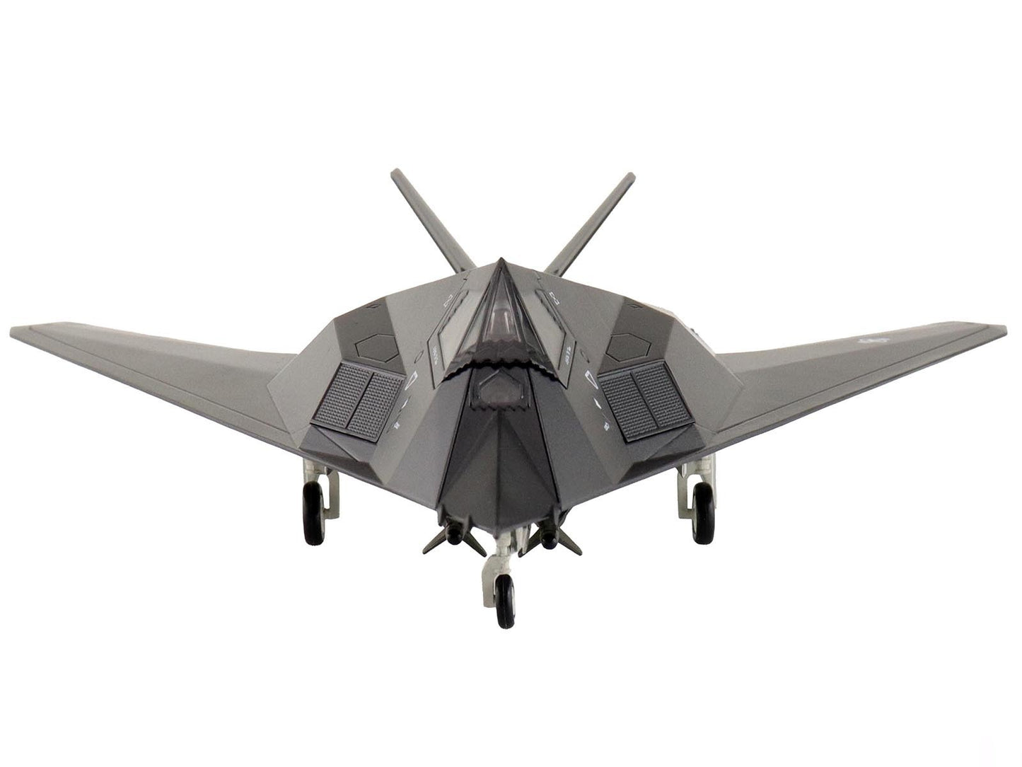 Gray fighter jet model on a white background