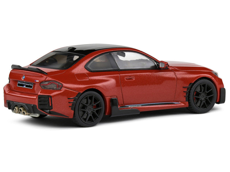 Red sports car model on a white background
