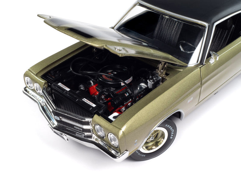 Model car with hood open displaying engine on a white background