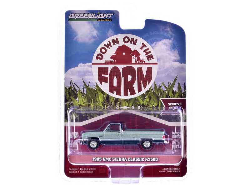 Model truck in packaging with 'Down on the Farm' branding