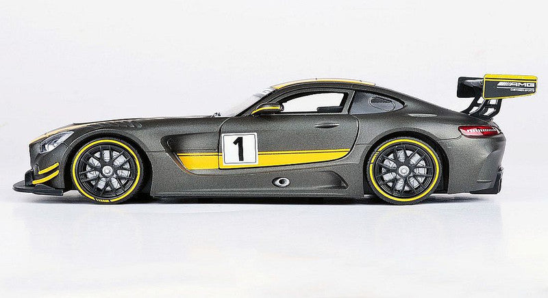 Gray and yellow sports car on a white background