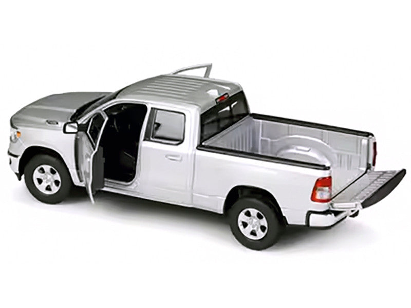 Silver pickup truck with open door on white background