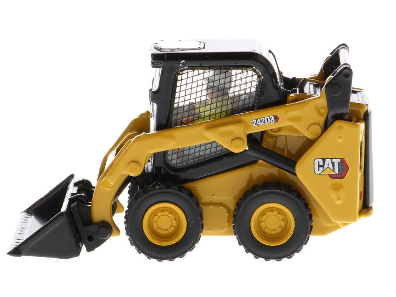 Toy skid steer loader with visible Caterpillar logo on a white background