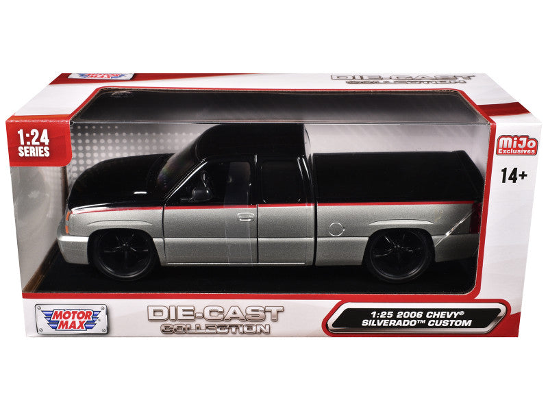 Die-cast model of a 2006 Chevy Silverado Custom in packaging with Motor Max branding.