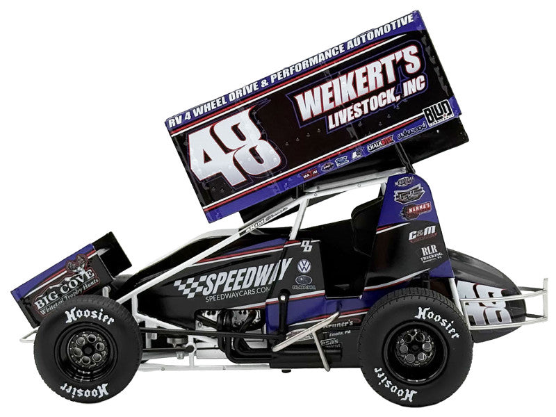 Model of a sprint car with various sponsor logos on a white background
