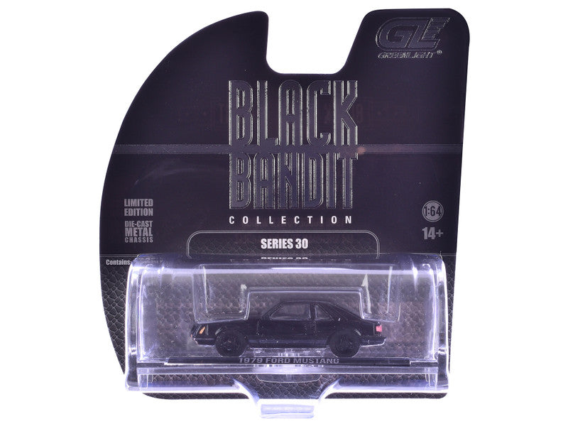 Model car in packaging with 'Black Collection' branding on a white background