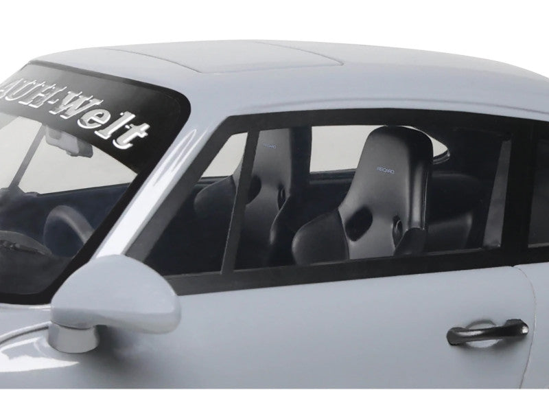 Car interior with a visible brand logo on the windshield
