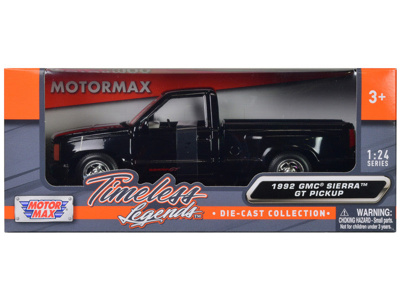 Motormax 1992 GMC Sierra GT pickup truck model in packaging on a white background