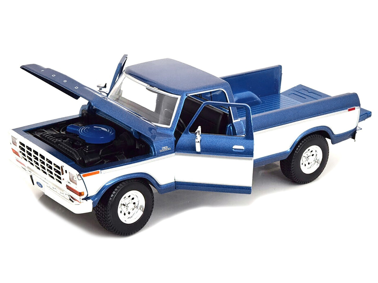 Model of a blue and white pickup truck on a white background