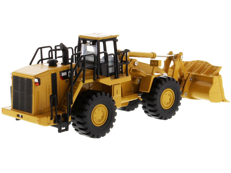 Model of a yellow construction vehicle on a white background