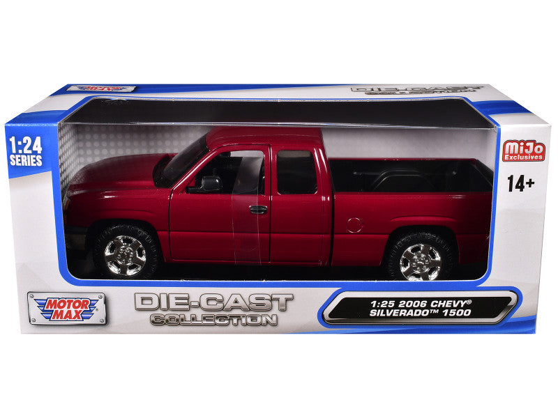 Red die-cast 2006 Chevy Silverado 1500 model truck in packaging