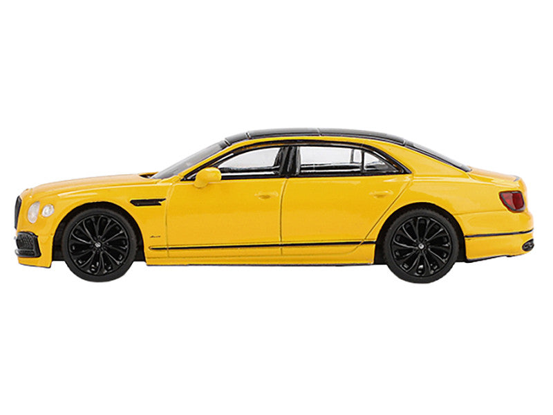 Yellow Bentley car model on a white background