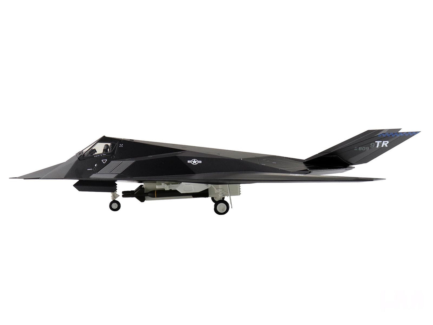 Black stealth aircraft on a white background