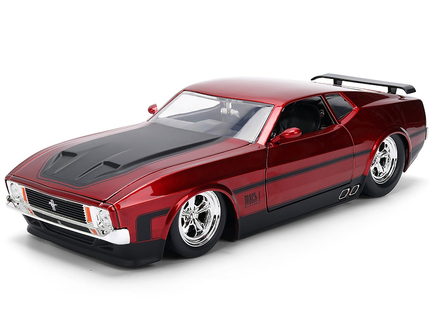 Red and black model car on a white background