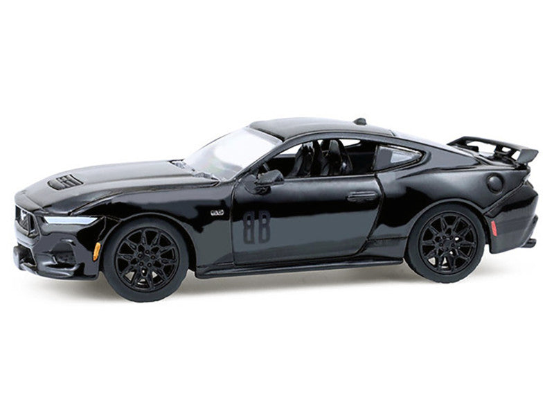 Black sports car model on a white background