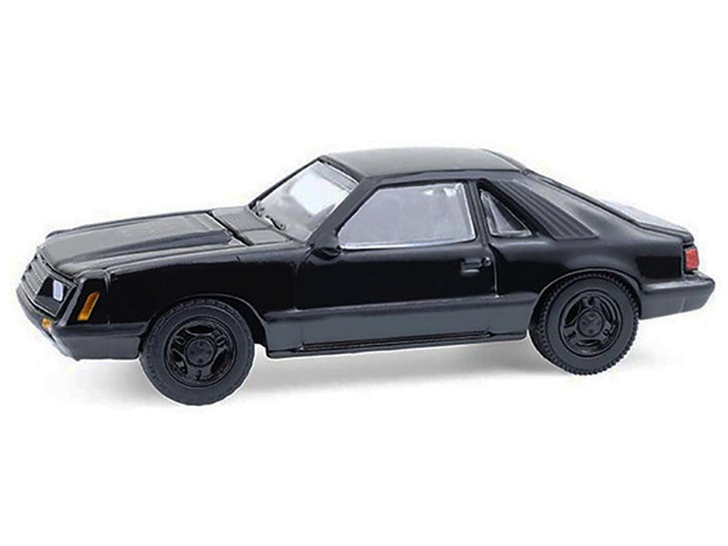 Black model car on a white background
