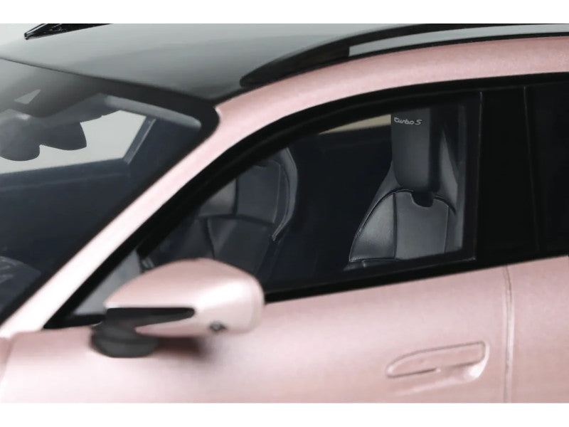 Close-up of a car's interior with a focus on the door and window.