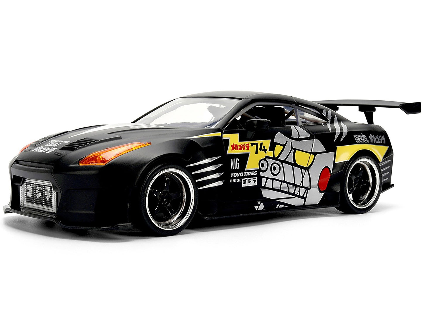 Black toy car with colorful graphics on a white background