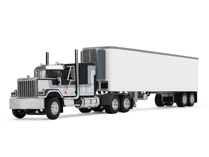 Model of a large truck with a trailer on a white background